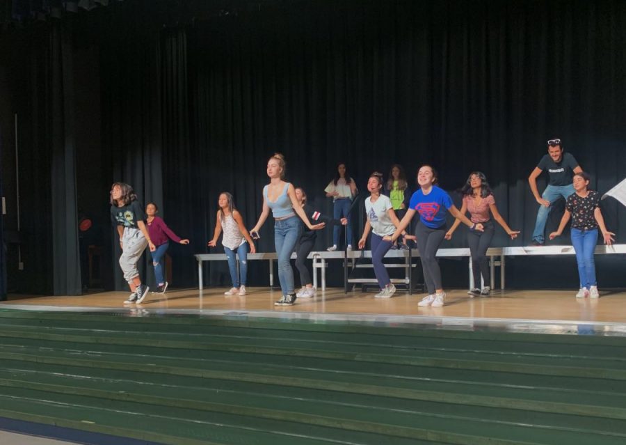 Practice makes perfect. The cast is working hard to learn and perfect the dance choregrapghy for Singin in the Rain. 
